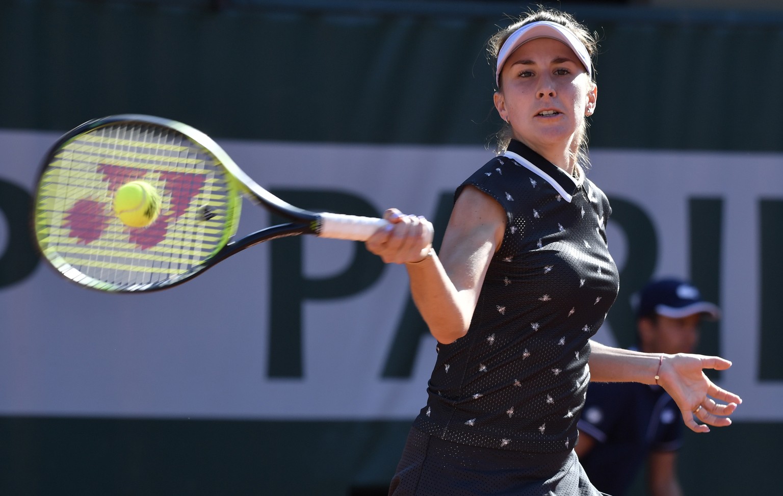 epa07615794 Belinda Bencic of Switzerland plays Donna Vekic of Croatia during their women’s third round match during the French Open tennis tournament at Roland Garros in Paris, France, 31 May 2019. E ...