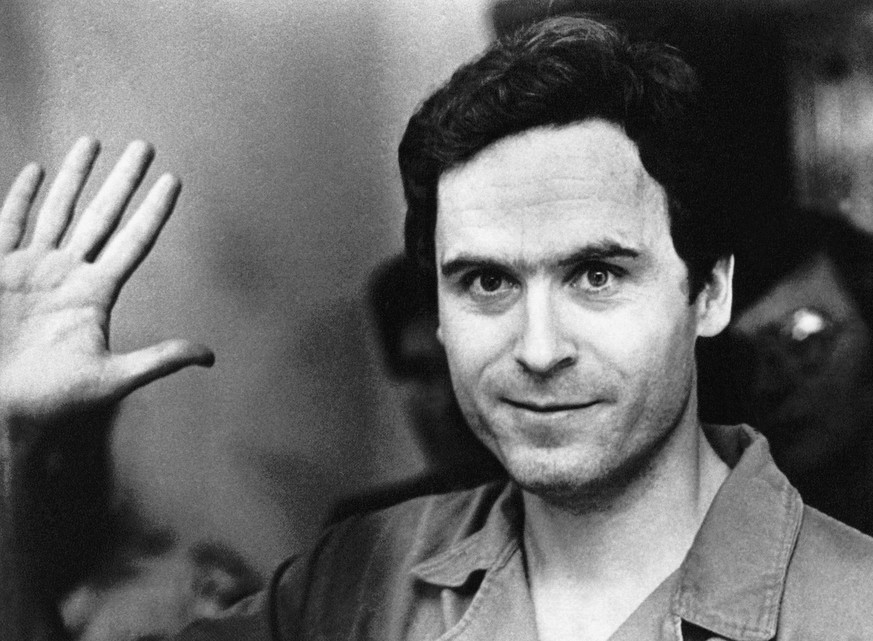 FILE - In this July 28, 1978, file pool photo, Ted Bundy mugs for the media after being informed of his indictment by a grand jury in Tallahassee, Fla. The Hollywood Reporter and Variety reported on M ...