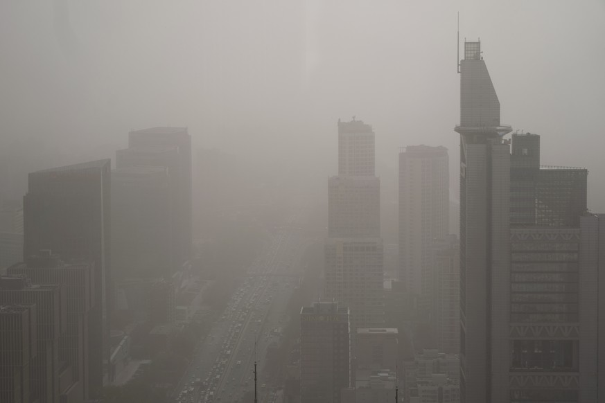 Buildings are shrouded in dust and sand in Beijing, Tuesday, April 11, 2023. The latest in a series of dust and sand storms sent air quality indices soaring in China&#039;s capital overnight on Monday ...