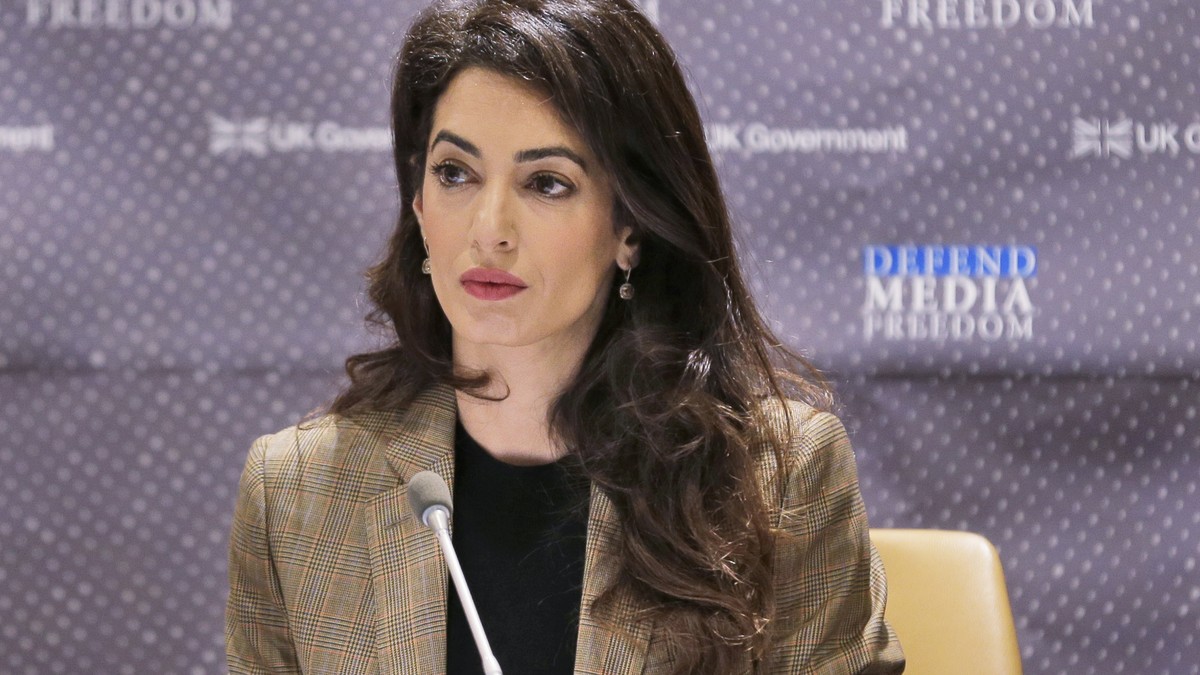 FILE - Attorney Amal Clooney listens during a panel discussion on media freedom, Sept. 25, 2019, at the United Nations headquarters. Amal Clooney is one of the legal experts who recommended that the w ...