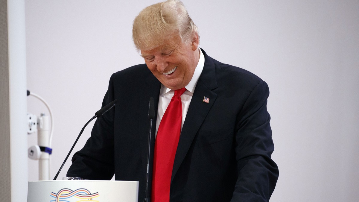President Donald Trump laughs as he speaks to the Women's Entrepreneurship Finance event at the G20 Summit, in Hamburg, Germany, Saturday, July 8, 2017. (AP Photo/Evan Vucci)