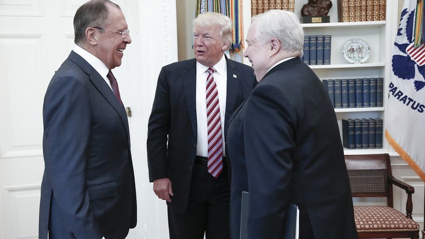 epa05955486 A handout photo made available by the Russian Foreign Ministry shows US President Donald J. Trump (C) speaking with Russian Foreign Minister Sergei Lavrov (L) and Russian Ambassador to the ...