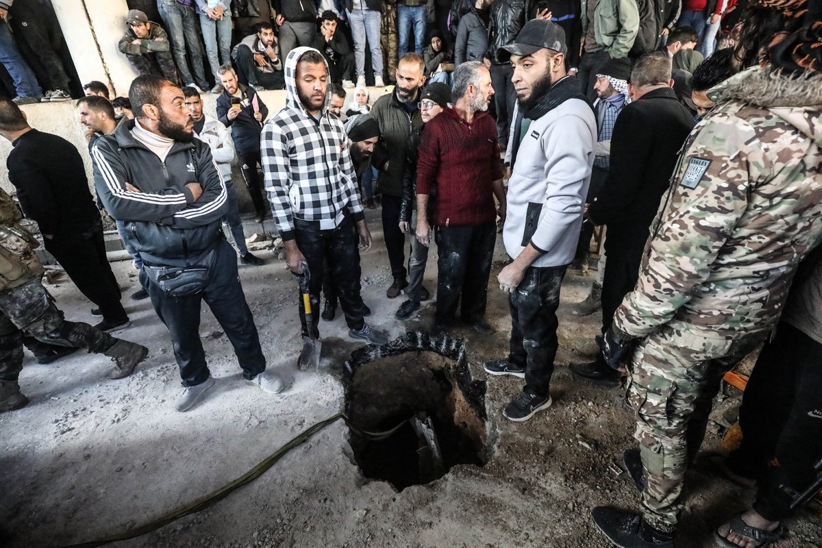 DAMASCUS, SYRIA - NOVEMBER 9: People wait as teams carry out investigation in secret compartments at Sednaya Prison after the fall of the Assad regime in Damascus, Syria on December 9, 2024. Anadolu r ...