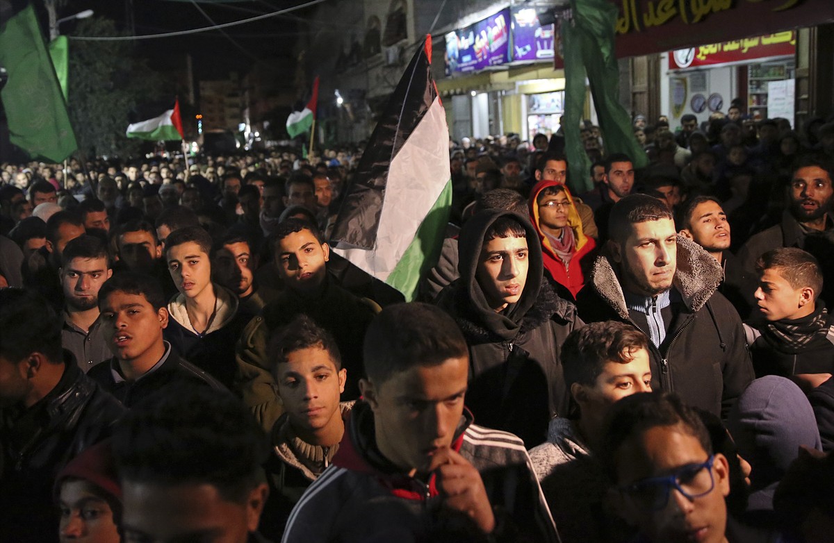 Hamas supporters stage a protest against the possible U.S. decision to recognize Jerusalem as Israel's capital, in Jebaliya Refugee Camp, Gaza Strip, Wednesday, Dec. 6, 2017. President Donald Tru ...