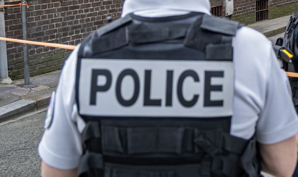 epa11347400 French police officers stand guard in a street outside a synagogue, where a man was shot, in Rouen, northern France, 17 May 2024. According to the prosecutor of the city of Rouen, the poli ...