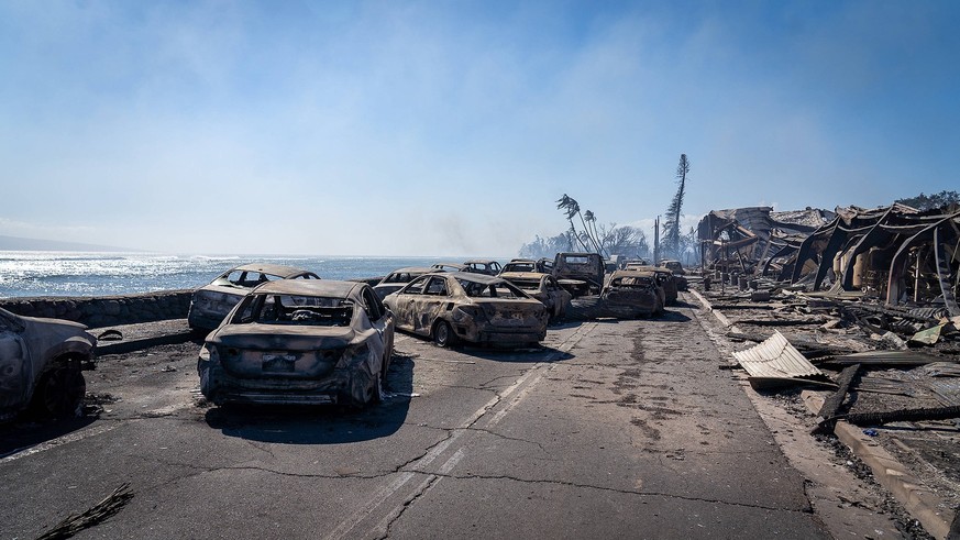 August 9, 2023, Lahaina, Maui, Hawaii, USA: Destroyed cars line the streets in Lahaina on Wednesday in the aftermath of destructive fires. The death toll from the fast-moving wildfires from Hawaii has ...