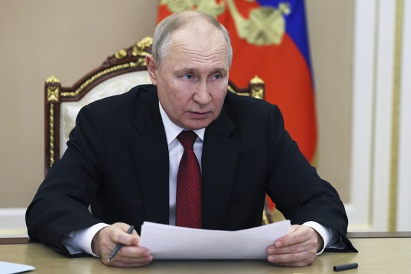 Russian President Vladimir Putin attends a cabinet meeting via video conference in Moscow, Russia, Wednesday, June 21, 2023. (Gavriil Grigorov, Sputnik, Kremlin Pool Photo via AP)