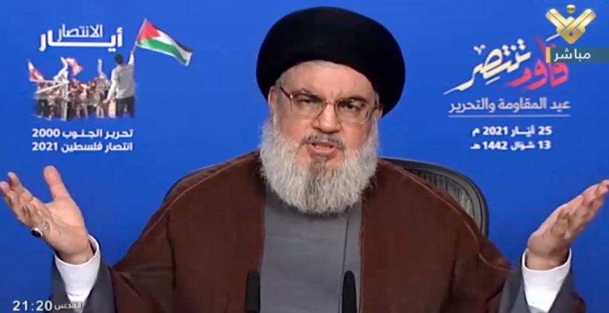 epa09227692 A grab picture from Hezbollah&#039;s al-Manar TV shows Hezbollah leader Sayyed Hassan Nasrallah giving a speech to commemorate the &#039;Resistance and Liberation Day&#039; in Beirut, Leba ...