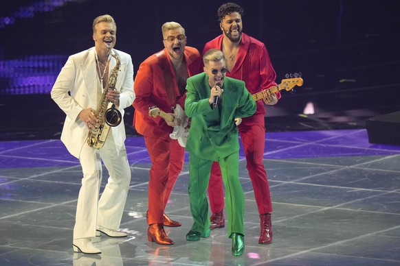 Citi Zeni from Latvia singing Eat Your Salad performs during rehearsals at the Eurovision Song Contest in Turin, Italy, Monday, May 9, 2022. (AP Photo/Luca Bruno)