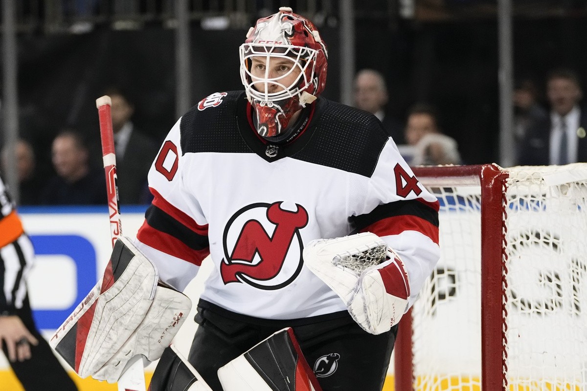 New Jersey Devils goaltender Akira Schmid (40) protects his net during the second period of Game 4 of an NHL hockey Stanley Cup first-round playoff series against the New York Rangers Monday, April 24 ...