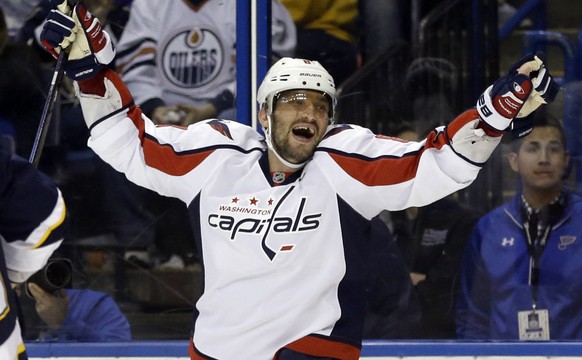 FILE - In this Saturday, April 9, 2016 file photo, Washington Capitals&#039; Alex Ovechkin, of Russia, celebrates after scoring his third goal of an NHL hockey game during the third period against the ...