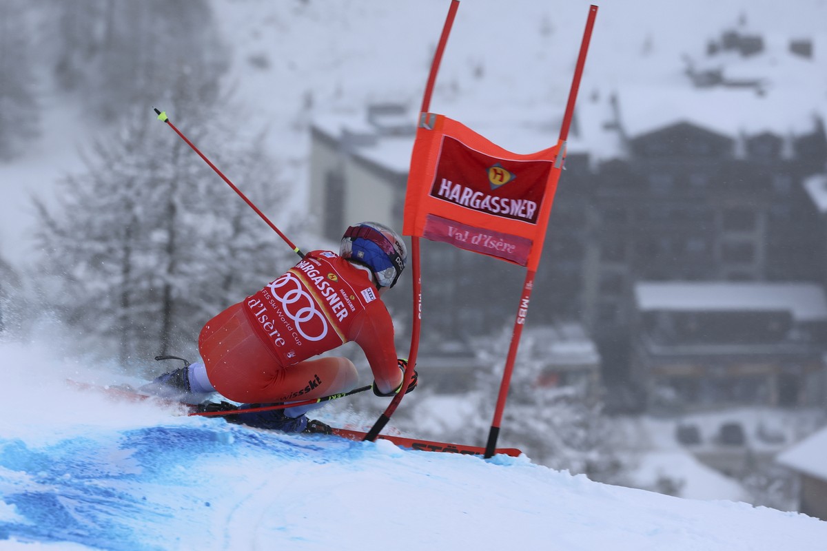 Switzerland's Marco Odermatt speeds down the course during the first run of an alpine ski, men's World Cup giant slalom, in Val D'Isere, France, Saturday, Dec.10, 2022. (AP Photo/Marco  ...