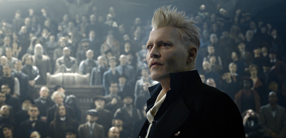 This image released by Warner Bros. Pictures shows Johnny Depp in a scene from "Fantastic Beasts: The Crimes of Grindelwald." (Warner Bros. Pictures via AP)