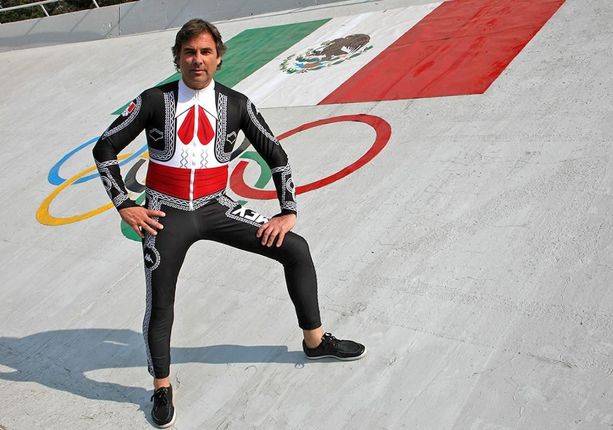 epa04045613 A handout photograph made available by the Mexican Olympic Committee on 28 January 2014 shows Mexican born skier Hubertus of Hohenlohe presenting his racing suit for the Sochi Olympic Game ...