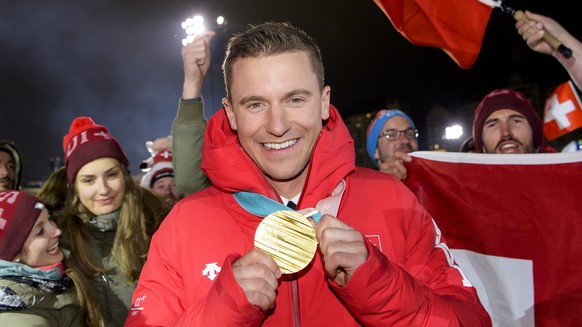 Gold medal winner Nevin Galmarini of Switzerland celebrates at the House of Switzerland after the Snowboard Parallel Slalom event during the XXIII Winter Olympics 2018 in Pyeongchang, South Korea, on  ...