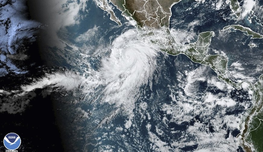 This satellite image taken at 10:50am EDT on Thursday, Aug. 17, 2023, and provided by the National Oceanic and Atmospheric Administration (NOAA) shows Hurricane Hilary off the Pacific coast of Mexico. ...