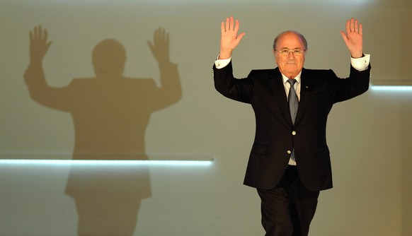 FILE - JUNE 02, 2015: Sepp Blatter has announced that he will resign as FIFA president KUALA LUMPUR, MALAYSIA - NOVEMBER 23: FIFA President Joseph S. Blatter waves to the audience as he enters the sta ...