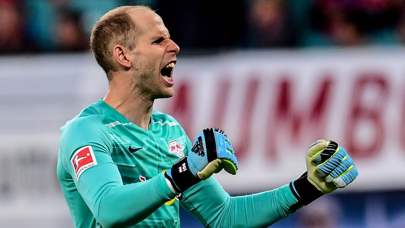 epa07842672 Leipzig&#039;s goalkeeper Peter Gulacsi celebrates their 1-1 goal during the German Bundesliga soccer match between RB Leipzig vs FC Bayern Munich in Leipzig, Germany, 14 September 2019. E ...