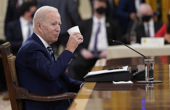 FILE - President Joe Biden listens as reporters ask questions as he meet with Mexican President Andrés Manuel L