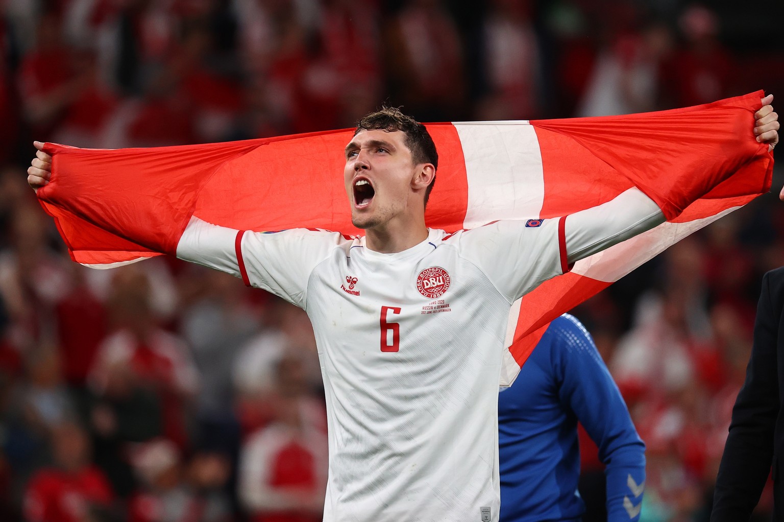 epa09292125 Andreas Christensen of Denmark reacts after winning the UEFA EURO 2020 group B preliminary round soccer match between Russia and Denmark in Copenhagen, Denmark, 21 June 2021. EPA/Wolfgang ...