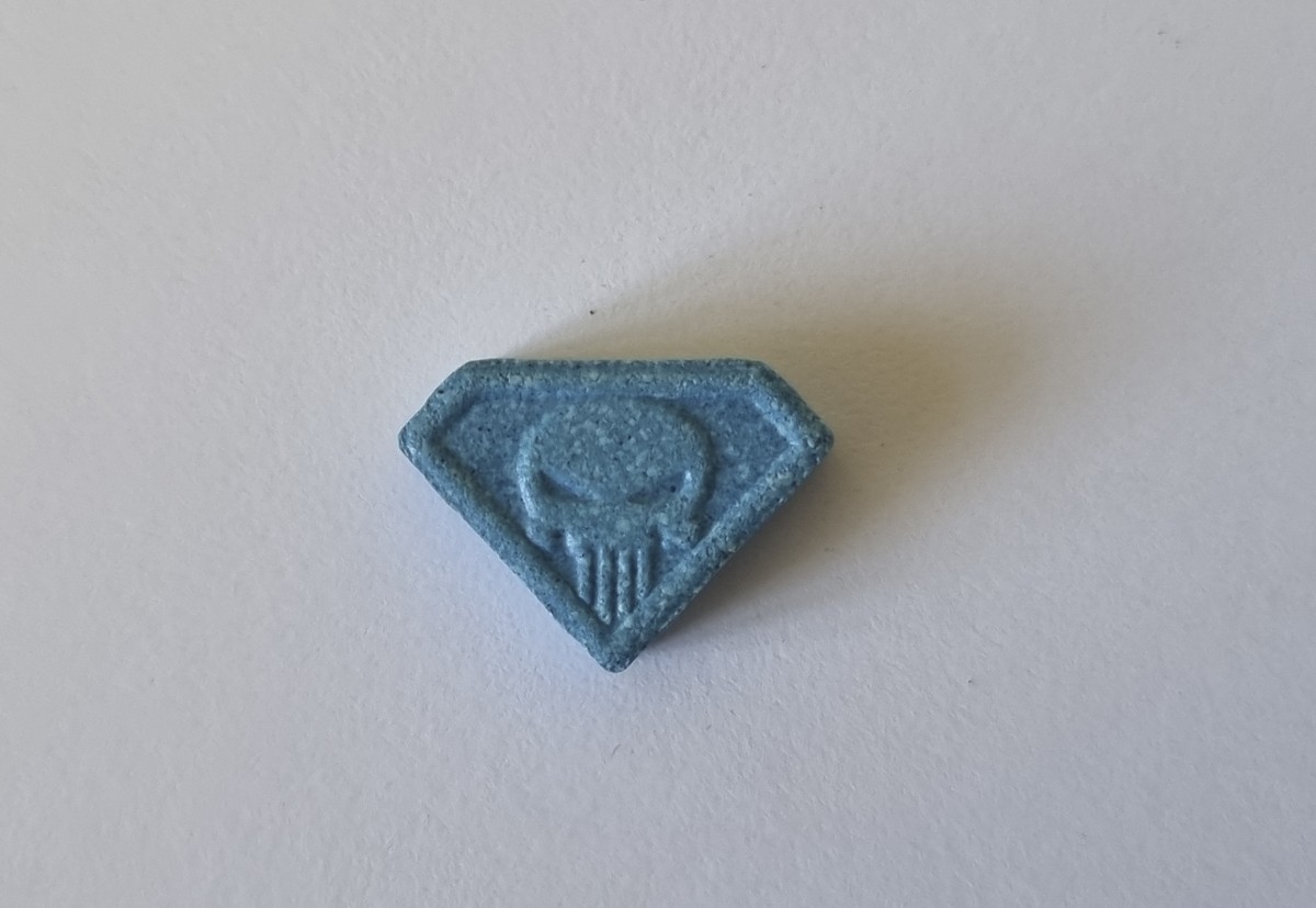 This undated handout photo provided on Wednesday, June 28, 2023 by the Neuhardenberg Police department shows a so-called 'Blue Punisher' ecstasy pill. German police have warned of a potentia ...