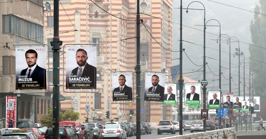 epa08818669 A general view showing various election campaign posters in Sarajevo, Bosnia and Herzegovina, 13 November 2020. More than three million Bosnian citizens are eligible to vote in the country ...