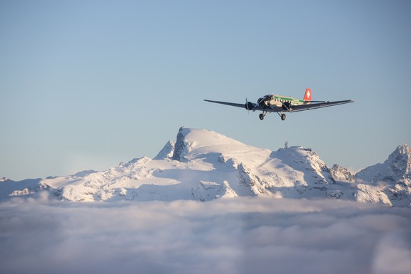 HANDOUT - Undated pic of a JU-52 aircraft of the JU-AIR in the air. A JU-52 of the JU-AIR crashed on Saturday afternoon, 04 August 2018 at Piz Segnas above Flims, Switzerland. Swiss police say all 20  ...