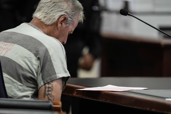 Colin Gray, 54, the father of Apalachee High School shooter Colt Gray, 14, sits in the Barrow County courthouse for his first appearance, on Friday, Sept. 6, 2024, in Winder, Ga. (AP Photo/Brynn Ander ...