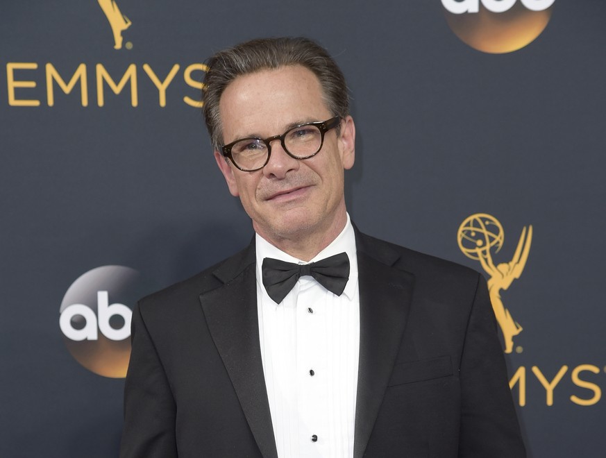 FILE - Peter Scolari arrives at the 68th Primetime Emmy Awards in Los Angeles on Sept. 18, 2016. Scolari, a versatile character actor whose television roles included a yuppie producer on