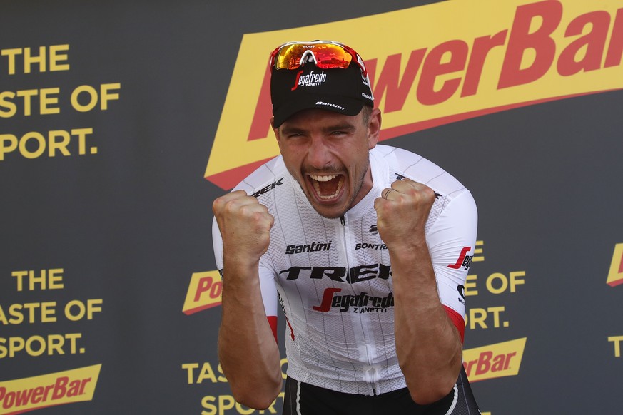 Germany's John Degenkolb celebrates on the podium after the ninth stage of the Tour de France cycling race over 156.5 kilometers (97.2 miles) with start in Arras and finish in Roubaix, France, Su ...