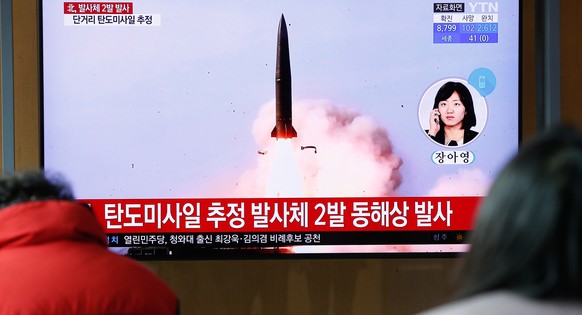 epa08310944 South Korean people watch breaking news of North Korea&#039;s projectile launch, at Seoul Station in Seoul, South Korea, 21 March 2020. According to South Korea&#039;s military, North Kore ...