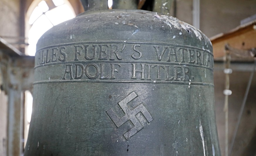 epa06568397 (FILE) - A view of a bell inside the church Jakobskirche (St James) in Herxheim am Berg, Germany, 12 June 2017. Since 1934, the bell tower houses three bells of which its smallest shows th ...