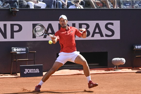 epa11335325 Novak Djokovic of Serbia in action against Alejandro Tabilo of Chile (not pictured) during their men&#039;s singles match at the Italian Open tennis tournament in Rome, Italy, 12 May 2024. ...