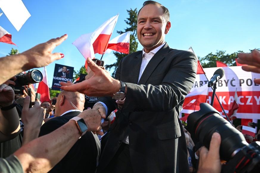 epa12145647 Head of the Institute of National Remembrance (IPN) and candidate in the 2025 presidential elections, Karol Nawrocki meets with local residents in Biala Podlaska, Poland, 30 May 2025. Karo ...