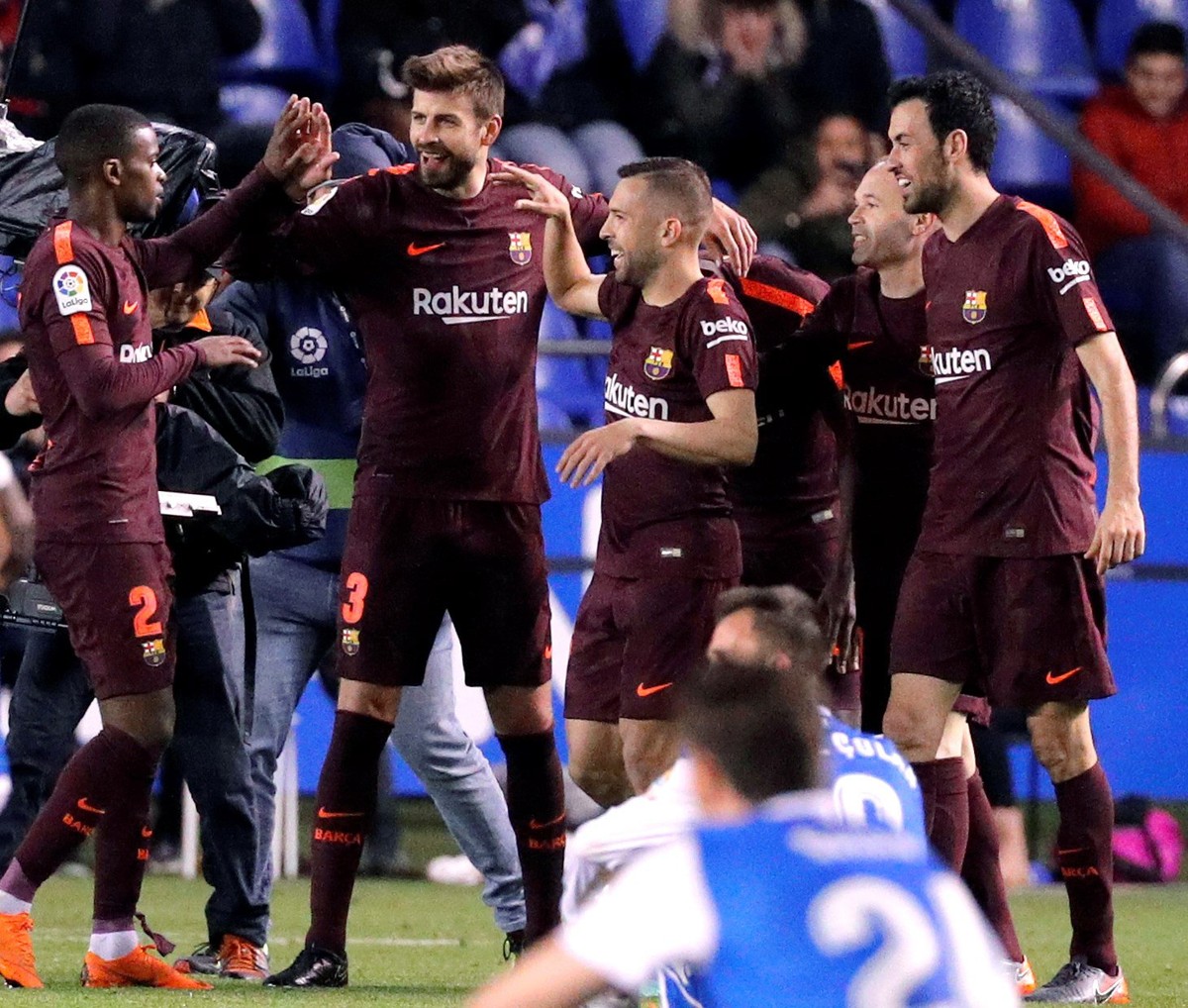 epa06701810 FC Barcelona's players celebrate after winning against Deportivo de la Coruna during their Spanish Primera Division soccer match at Riazor stadium, in La Coruna, Spain, 29 April 2018. ...