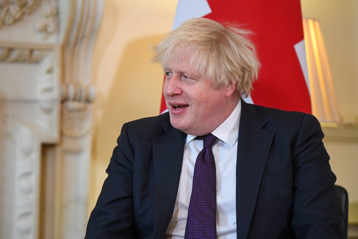 epa09618641 Boris Johnson, U.K. prime minister, during his bilateral meeting with Hassanal Bolkiah, Brunei's sultan, inside number 10 Downing Street in London, Britain, 03 December 2021. The U.K. ...
