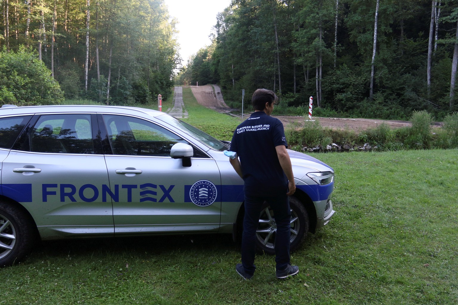 epa09353882 A member of the European Union border agency Frontex in Kapciamiestis BCU, Lithuania, 19 July 2021. The European Union border agency Frontex is deploying 60 border guards to control the fl ...