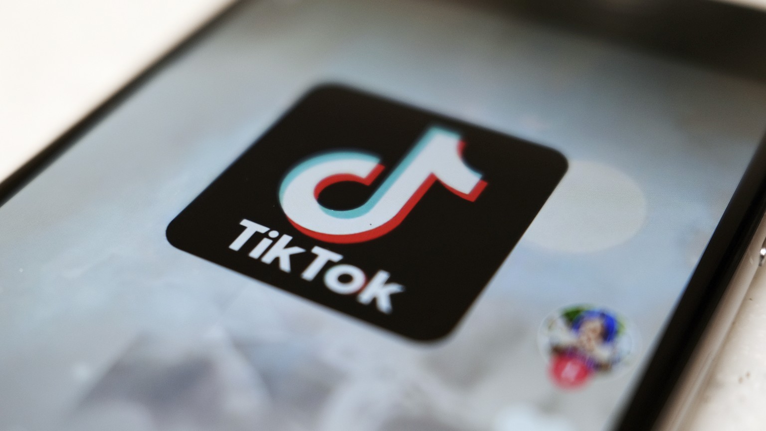 FILE - This Monday, Sept. 28, 2020, file photo, shows the TikTok logo on a smartphone in Tokyo. The Chinese government has made investments in two of the nation&#039;s most significant technology firm ...