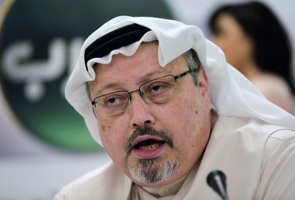 FILE - In this Dec. 15, 2014, file photo, Saudi journalist Jamal Khashoggi speaks during a press conference in Manama, Bahrain. President Donald Trump says the U.S. will not levy additional punitive m ...