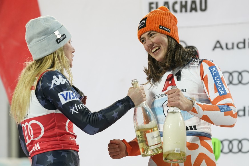 United States' Mikaela Shiffrin, left, congratulates winner Slovakia's Petra Vlhova during the podium ceremony for an alpine ski, women's World Cup slalom in Flachau, Austria, Tuesday, Jan.10, 2023. S ...