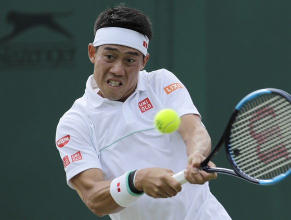 Japan&#039;s Kei Nishikori returns the ball to Kazakhstan&#039;s Mikhail Kukushkin in a men&#039;s singles match during day seven of the Wimbledon Tennis Championships in London, Monday, July 8, 2019. ...