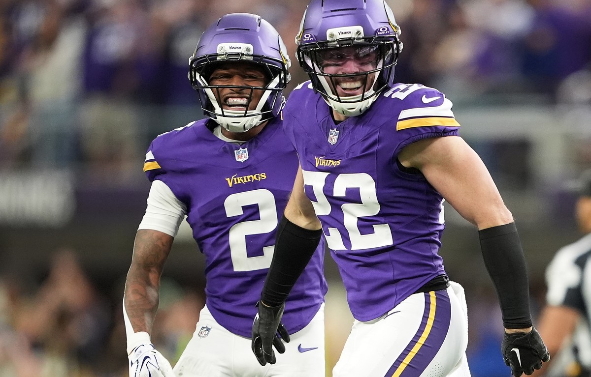 Minnesota Vikings safety Harrison Smith (22) celebrates with cornerback Isaiah Rodgers (2) after intercepting a pass against the Indianapolis Colts during the second half of an NFL football game in Mi ...