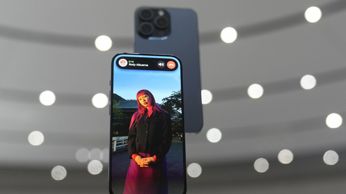 File - iPhone 15 Pro phones are shown at an announcement of new products in Cupertino, Calif., Tuesday, Sept. 12, 2023. On Thursday, Feb. 1, 2024, Apple will release its results for the holiday season ...