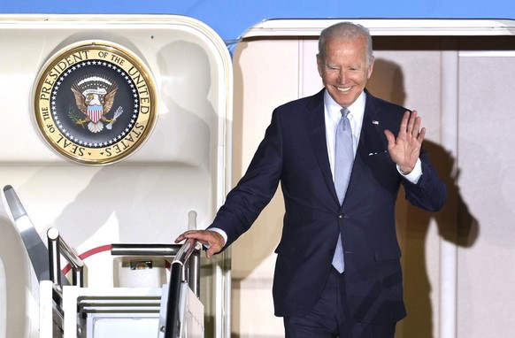 President Joe Biden waves as he leaves Air Force One after arriving at Franz-Josef-Strauss Airport near Munich, Germany Saturday, June 25, 2022, ahead of the G7 summit. The G7 Summit will take place a ...
