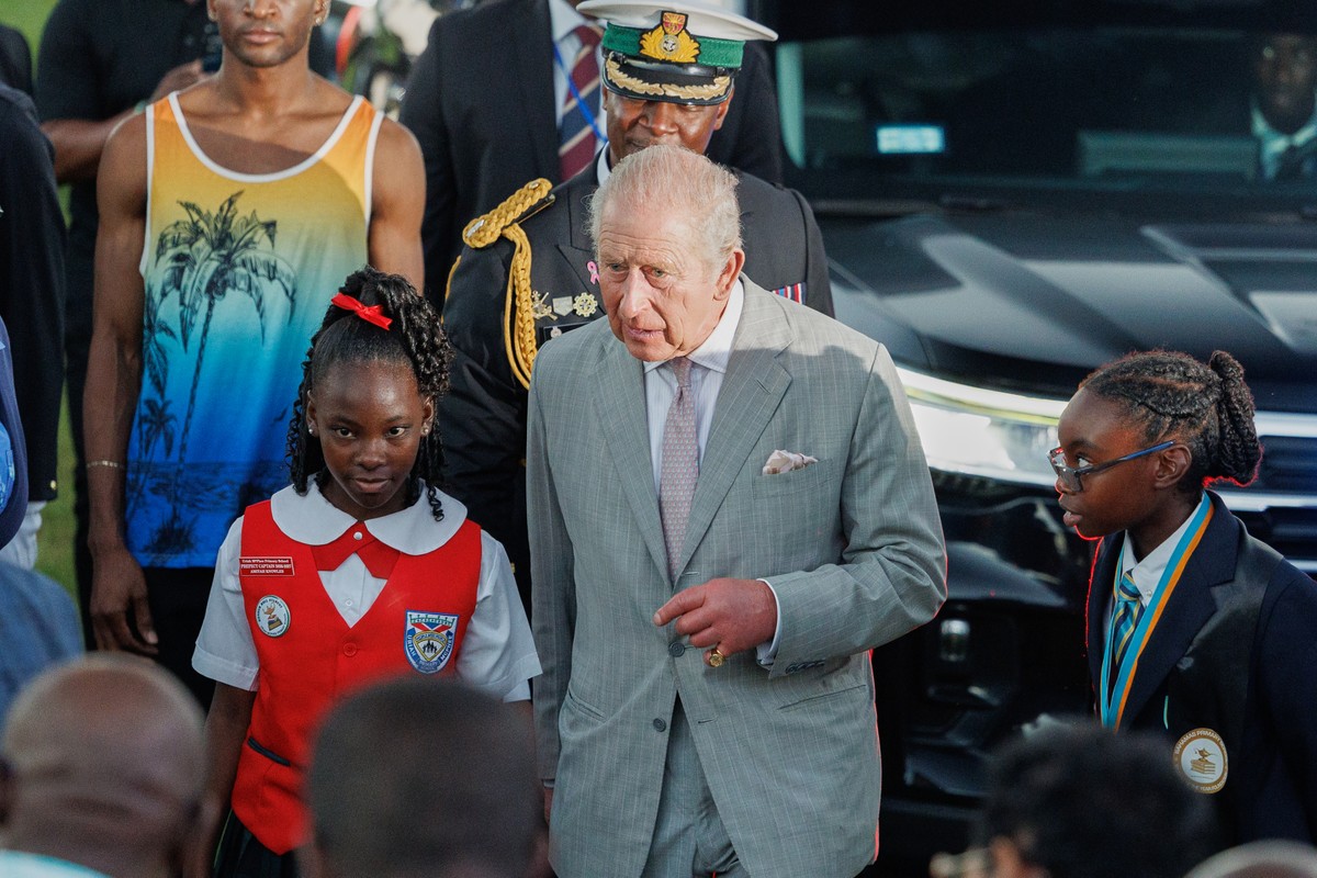Britain's King Charles III is escorted by students as he leaves The Future Bahamas Youth Rally and Exhibition at Clifford Park in Nassau, Bahamas, Tuesday, Oct. 27, 2026. (AP Photo/Tim Aylen)
Phi ...