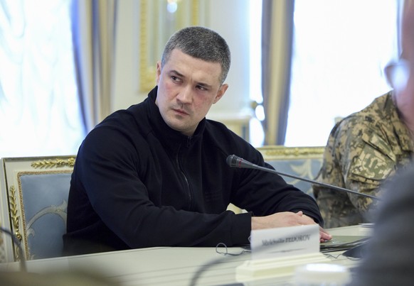epa12947837 A handout photo made available by the Ukrainian Presidential Press Service shows Ukraine's Defence Minister Mykhailo Fedorov attending the Ukrainian President Volodymyr Zelensky and G ...
