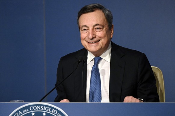 epa09653766 Italian Prime Minister Mario Draghi attends his year-end press conference in Rome, Italy, 22 December 2021. In his speech, the Italian Prime Minister hinted that he would be inclined to ac ...