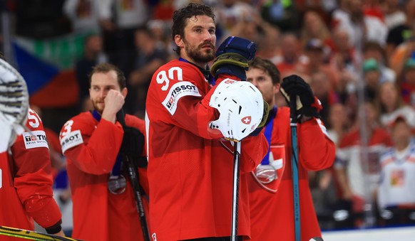 epa11372627 Switzerland's Roman Josi looks dejected after loosing the gold medal match between Switzerland and Czech Republic at the IIHF Ice Hockey World Championship 2024 at Prague Arena, in Pr ...