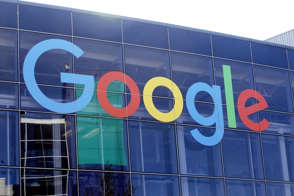 FILE - In this Sept. 24, 2019, file photo a sign is shown on a Google building at their campus in Mountain View, Calif. One of the European Union