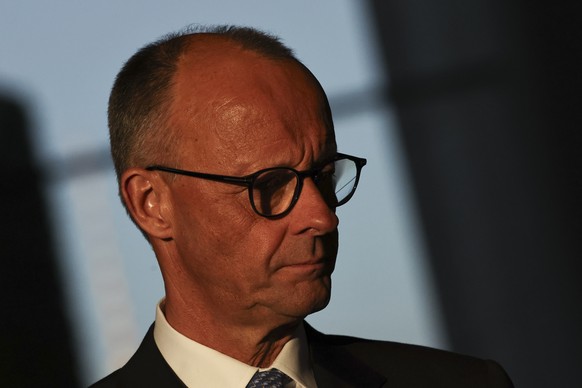 epa12078452 Newly elected German Chancellor Friedrich Merz attends a handover ceremony at the Chancellery in Berlin, Germany, 06 May 2025. The new German government is expected to be formed between th ...